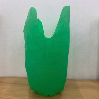 Green S-Cut Trash Bags on Roll for waste collection