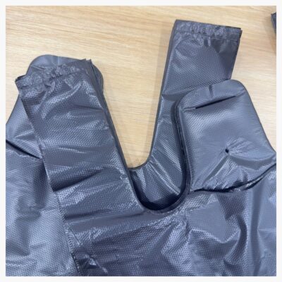Embossed vest carrier bag handle detail